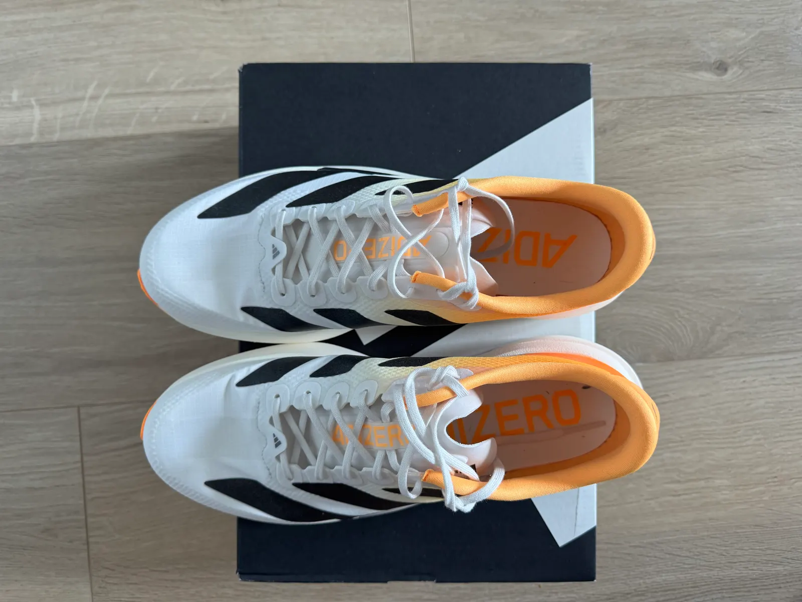 Top view of the Adidas Adizero EVO SL Woven showing the woven upper, lacing and gusseted tongue
